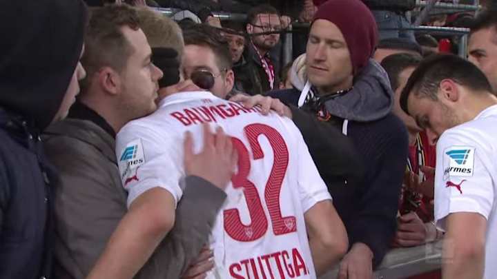 German soccer fans console young defender after costly mistake German soccer fans console young defender after costly mistake