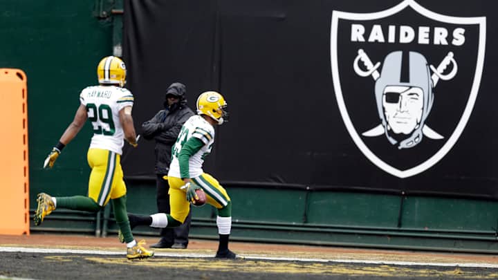 Packers beat Raiders 30-20 after clinching playoff spot Packers beat Raiders 30-20 after clinching playoff spot
