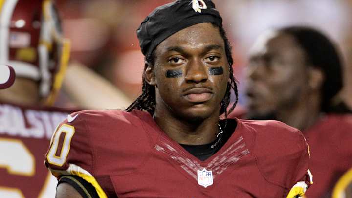 Redskins QB Robert Griffin III evades concussion questions Redskins QB Robert Griffin III evades concussion questions