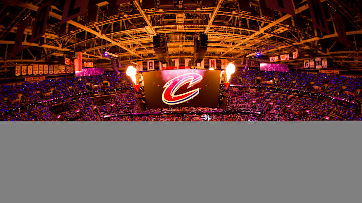Cavs chided for in-game video showing man throwing woman