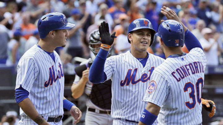 Granderson, Johnson power Mets past Rockies 12-3 for sweep
