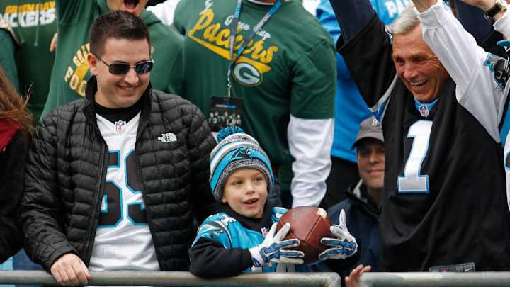 Virginia boy who lost father gets football from Cam Newton