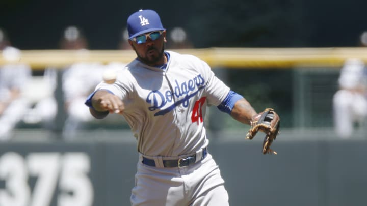 Guerrero's slam helps Dodgers beat Rockies 9-8 to split DH