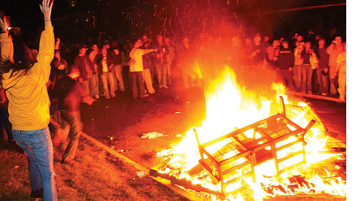 Morgantown, W. Va. bans outdoor furniture to prevent fires after games Morgantown, W. Va. bans outdoor furniture to prevent fires after games