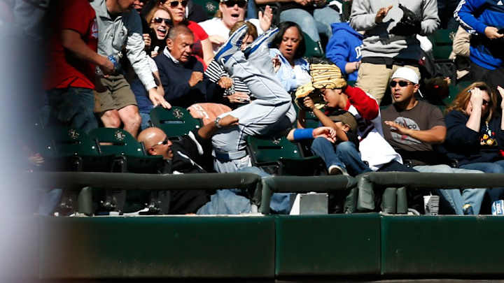 Fan receiving signed photo after Alex Gordon landed at his feet Fan receiving signed photo after Alex Gordon landed at his feet