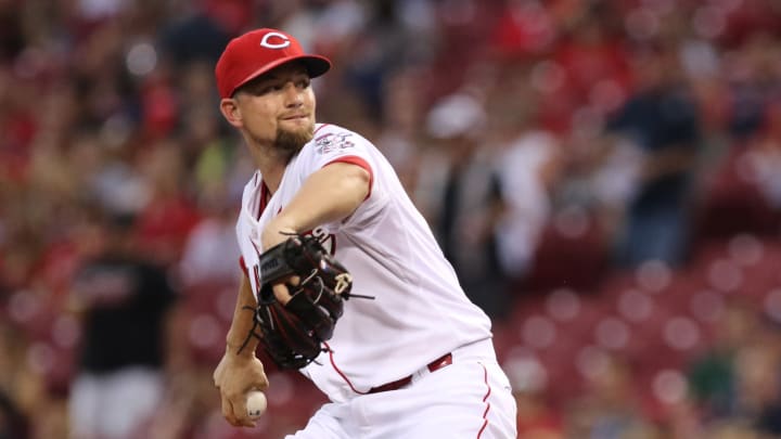 Leake pitches, hits Reds over Indians, 6-1