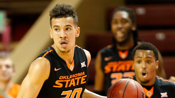 Oklahoma State survives wild finish in 82-77 win