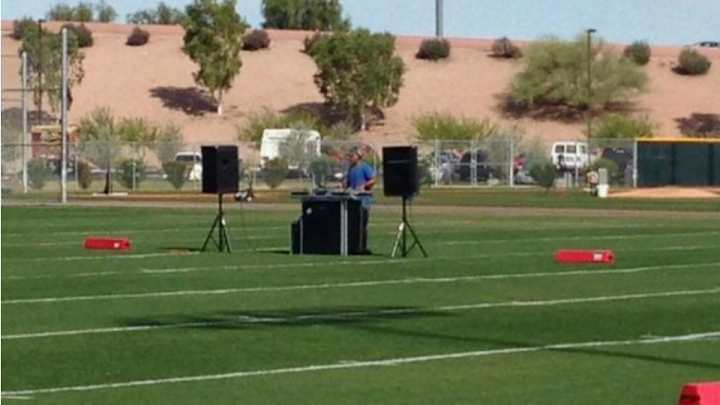Cubs practice features a DJ in the middle of the field Cubs practice features a DJ in the middle of the field