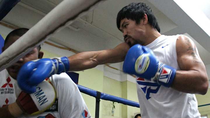 Floyd Mayweather, Manny Pacquiao agree to fight May 2