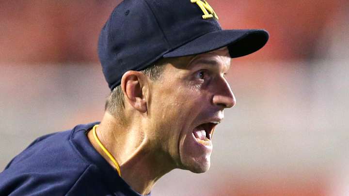 Harbaugh, Michigan regroup after opening loss