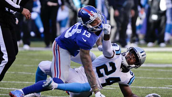 Watch: Odell Beckham Jr. launches himself at Josh Norman’s head