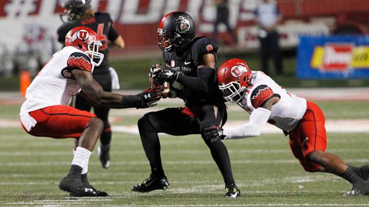 Booker's 156 yards, 2 TDs lead No. 21 Utah past Fresno St