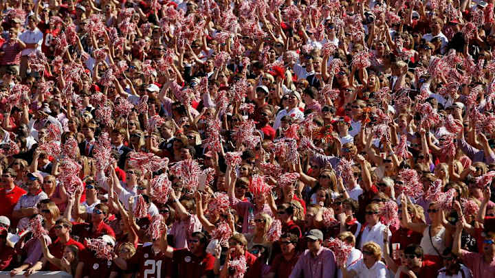 Alabama fan sports crimson artificial eye with ‘BAMA’ written on it