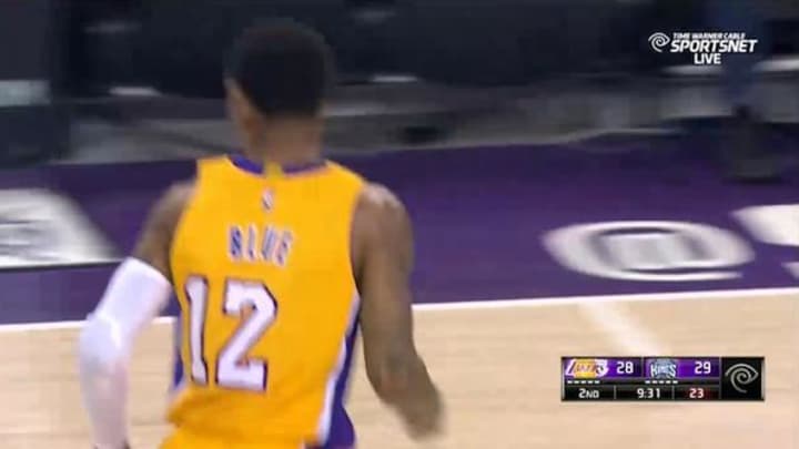 Vander Blue wore a Wayne Ellington jersey with a number stitched on