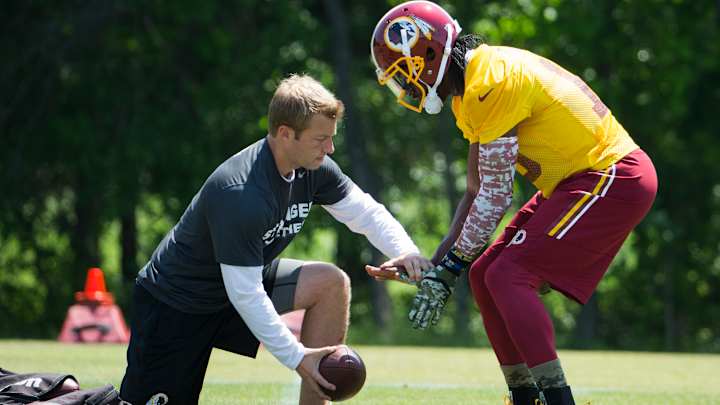 RG3 looks relaxed as Redskins begin voluntary workouts