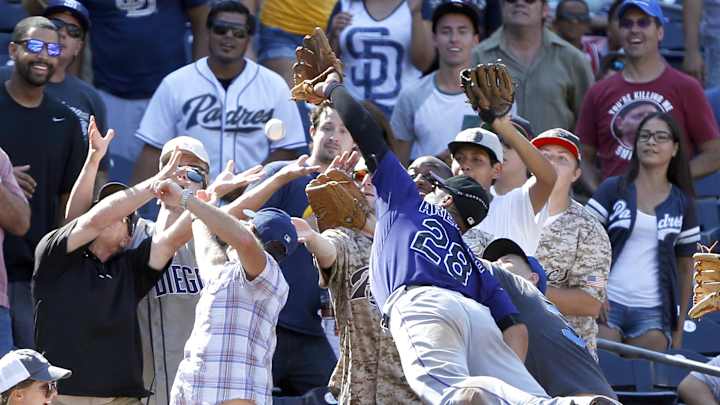 Arenado bruises chest in Rockies' win over Padres