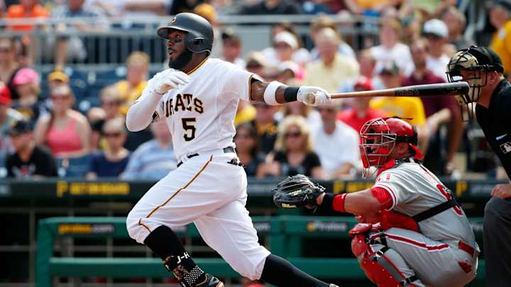 Cole wins 10th as Pirates top Phillies 4-3