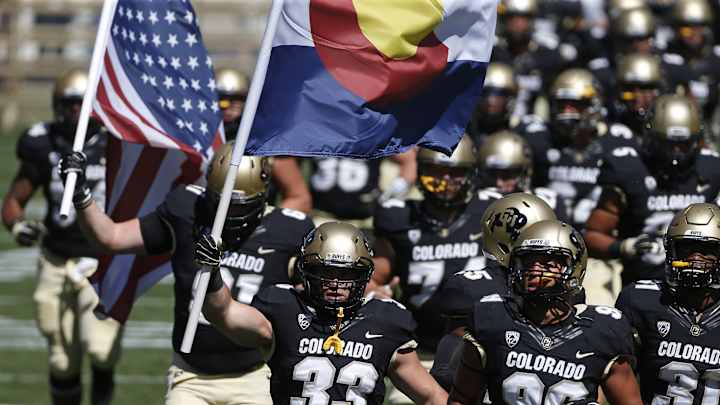 Colorado, Colorado State players linked by theater shooting
