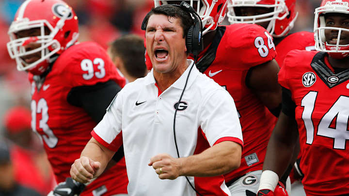 Watch: Georgia coach almost injures player while celebrating