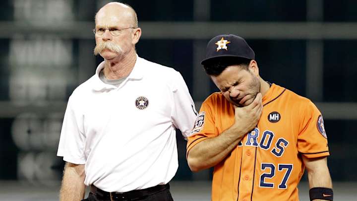 Astros' Jose Altuve exits game after collision with Carlos Correa
