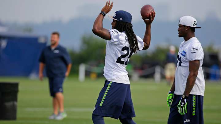 Wilson, Seahawks back on field for 1st time since Super Bowl Wilson, Seahawks back on field for 1st time since Super Bowl