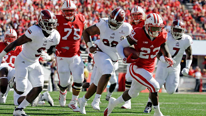 Ejections, fire alarm, but No. 24 Wisconsin beats Troy 28-3