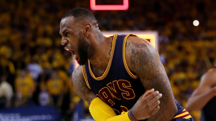 James carries Cavs to OT win over Warriors, evens NBA Finals