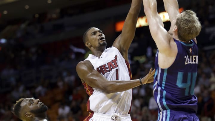 Bosh returns to the lineup, Hornets top Heat 90-77