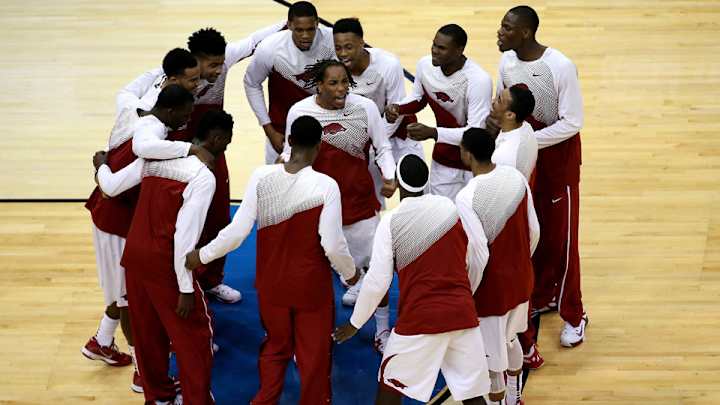 Arkansas bench throws shoe on court during middle of game