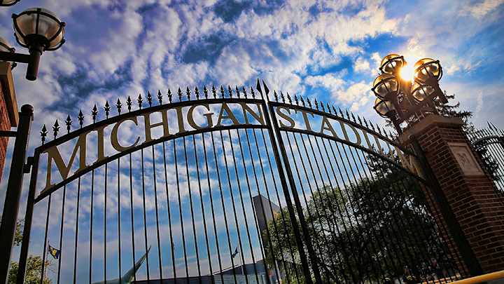 Michigan fan bride, Ohio State fan groom hold wedding at The Big House Michigan fan bride, Ohio State fan groom hold wedding at The Big House