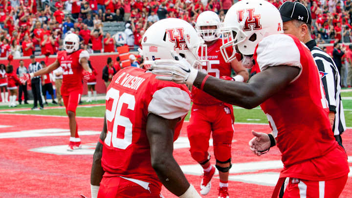 Ward leads No. 21 Houston to 52-31 win over No. 16 Navy