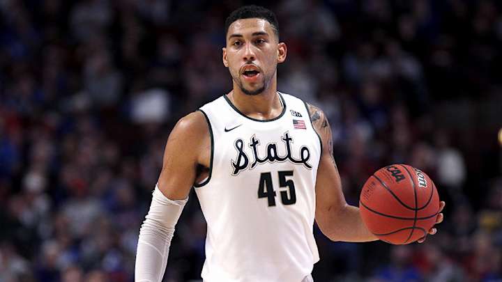 Spartans come together to help star Denzel Valentine survive & thrive