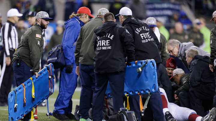 Arizona's Mike Iupati taken off on stretcher after collision