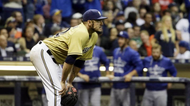 Brewers owner backs GM's decision to fire Roenicke