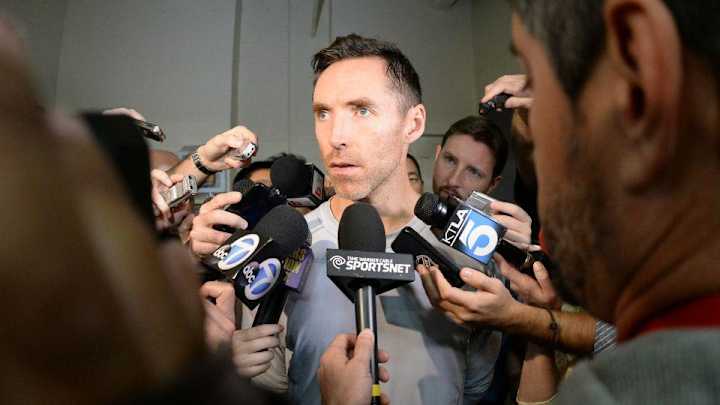 Steve Nash is wearing a luchador mask before Canada-Mexico game