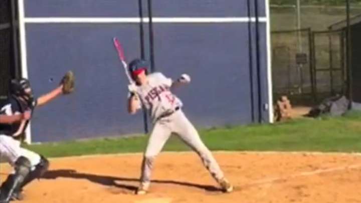 Watch: High school batter catches pitch to avoid being hit
