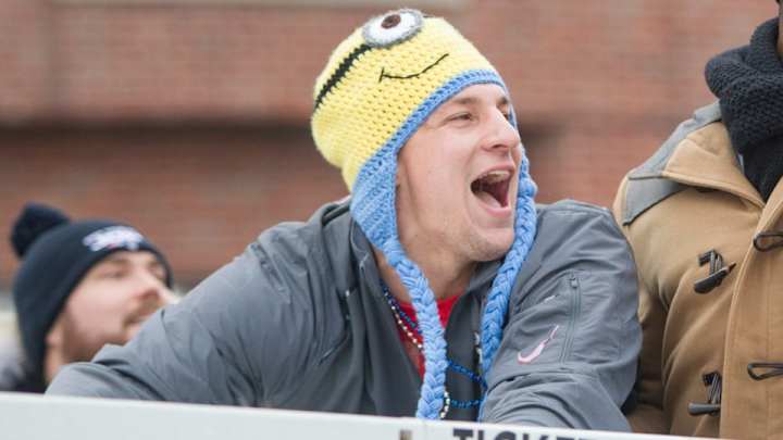 Here is Rob Gronkwski holding a puppy