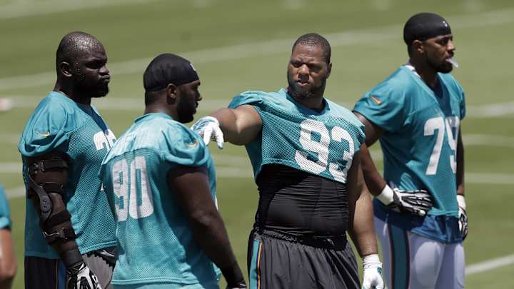 Suh finding his way with Dolphins, on and off the field Suh finding his way with Dolphins, on and off the field