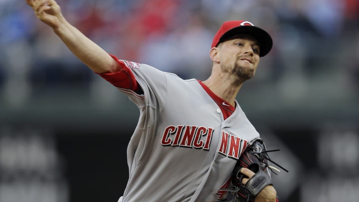 Phils rally for 5-4 win over Reds on pitcher's error in 11th