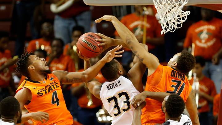 Olivier, Carroll lead Oklahoma State to 69-52 win