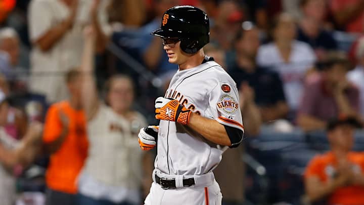 Giants' Kelby Tomlinson dedicates first MLB hit to batboy Kaiser Carlile