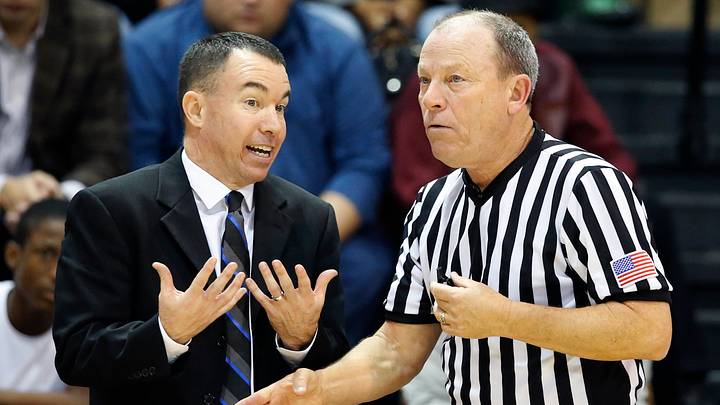 Corbetts officiate a Division I game together