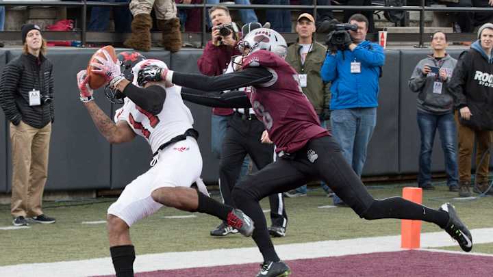 Montana routs Eastern Washington 57-16 behind Calhoun
