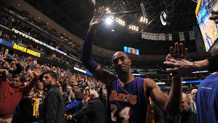 Bryant scores 31 as Lakers beat Nuggets 111-107