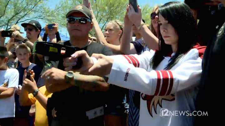 Watch: Glendale mayor O.K. after agreeing to be tased by Coyotes fan Watch: Glendale mayor O.K. after agreeing to be tased by Coyotes fan