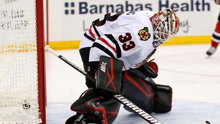 Zajac has goal, assist in 1st as Devils beat Blackhawks 4-2