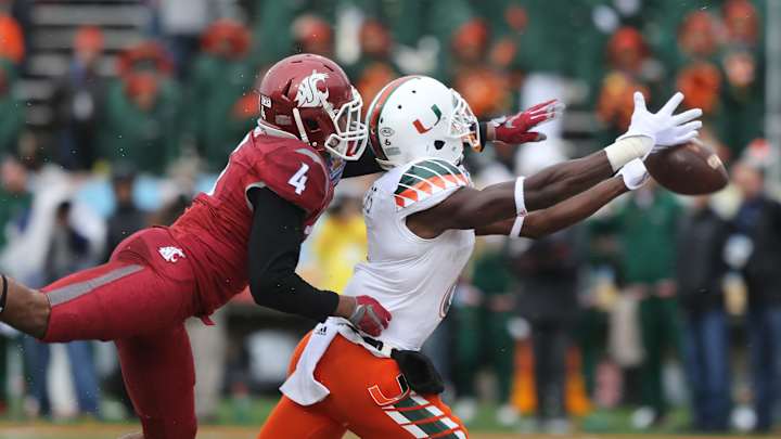 Washington State beats Miami 20-14 in snowy Sun Bowl