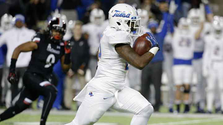 Navy triple option faces Tulsa's up-tempo spread