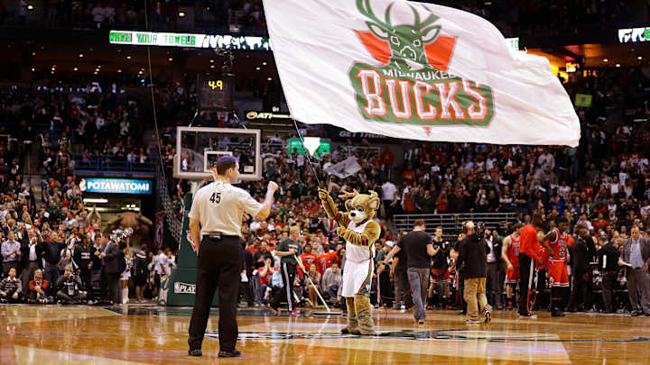 Bucks fans got free playoff tickets if they traded red shirts for green ones