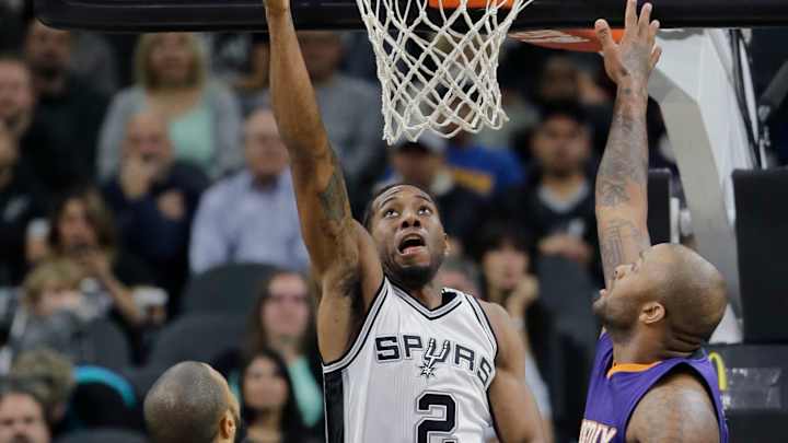 Leonard has 24, Spurs defense shines in 98-84 win over Suns